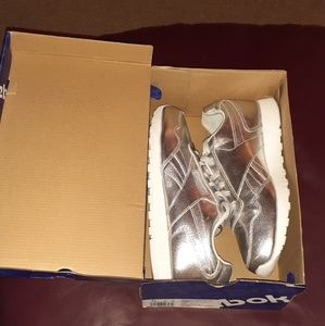 Silver Reebok running shoes